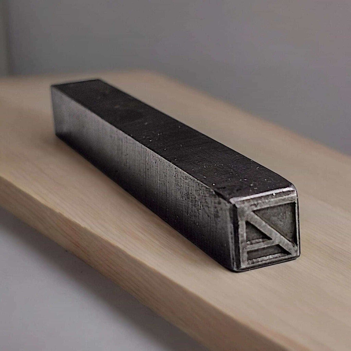 a close up of a remote control on a table